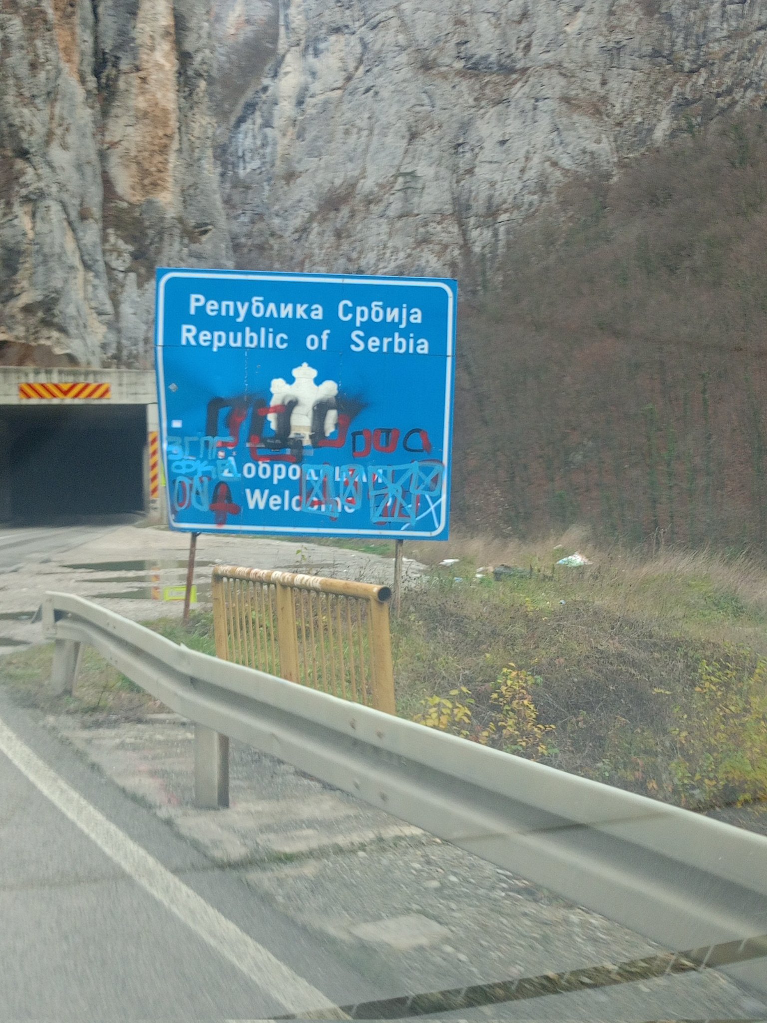Serbia tunnel entrance graffiti
