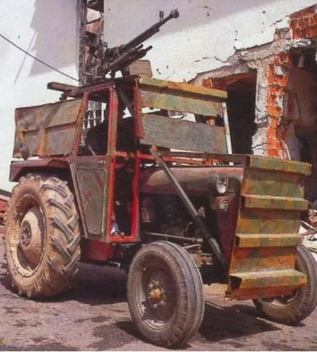 Tractor armed with a machine gun
